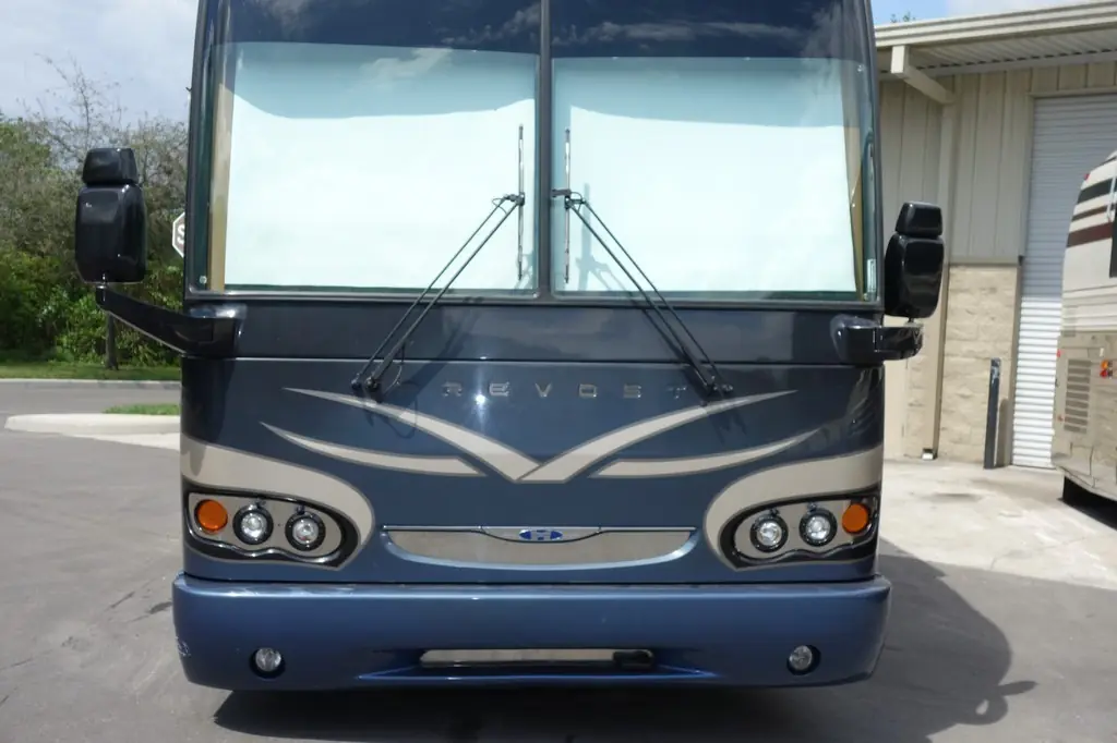 2009 Prevost Featherlite H3-45 triple slide before its 2018 facelift by Excalibur Coach