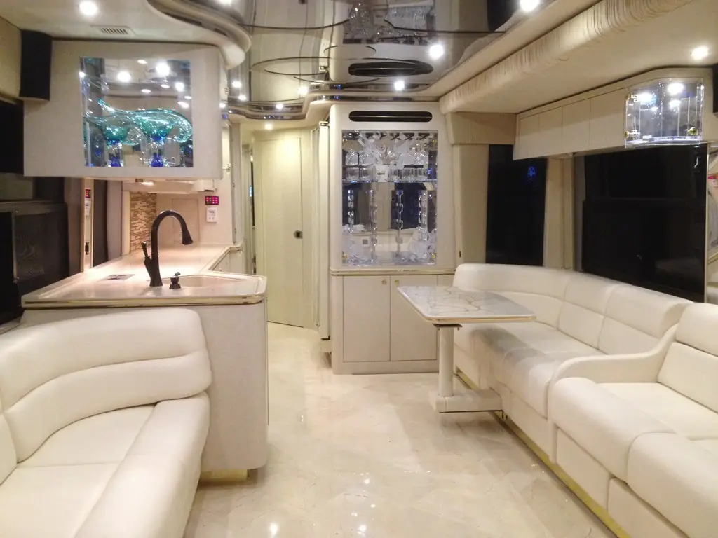 1997 Prevost H3-45 interior with new flooring and upholstery by Excalibur Coach