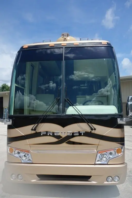 Prevost H3-45 Liberty after a 2016 facelift and windshield replacement by Excalibur Coach