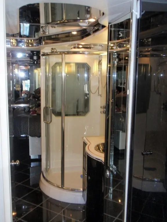 Prevost Featherlite H3-45 enlarged shower with new granite floor by Excalibur Coach