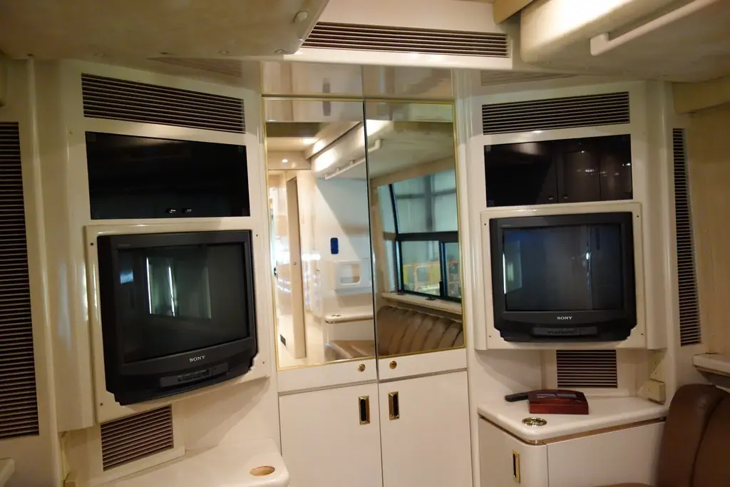 1995 Prevost H3 salon before a rear TV upgrade by Excalibur Coach