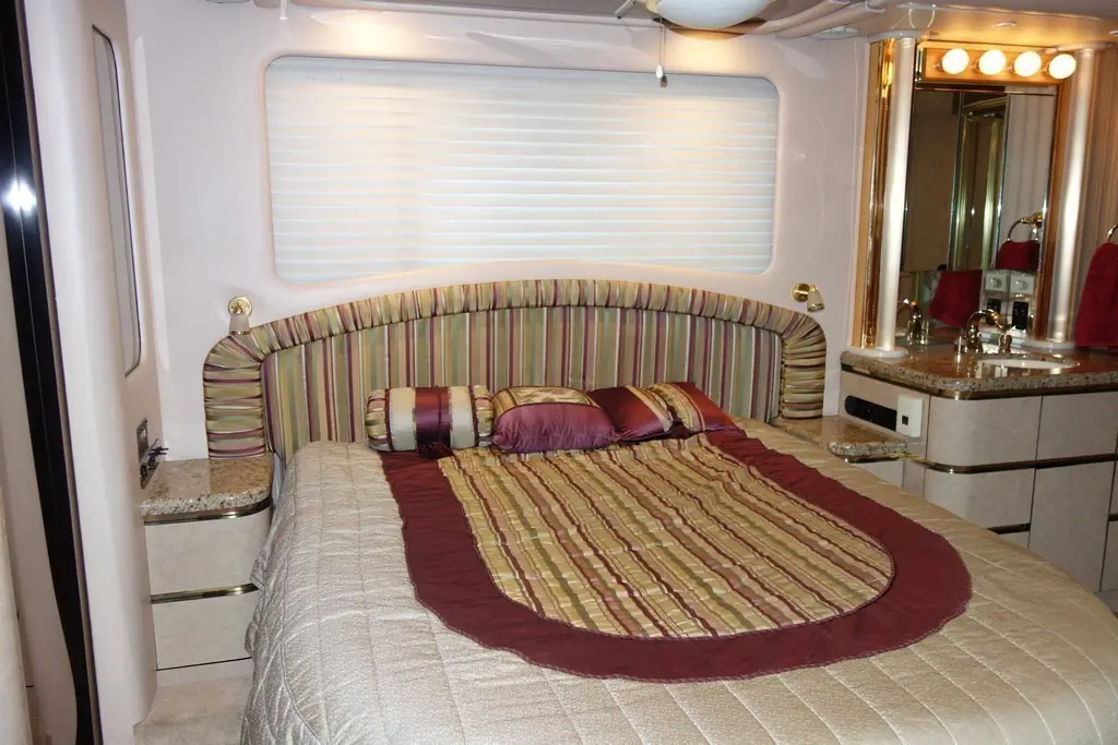 2001 Prevost Newell bedroom before a king bed and headboard upgrade by Excalibur Coach