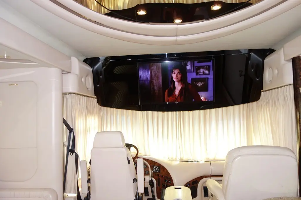 2001 Prevost Newell salon after new HD televisions and rewiring by Excalibur Coach
