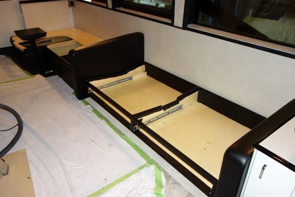 Slide-out mechanism exposed for repair in the Excalibur Coach shop
