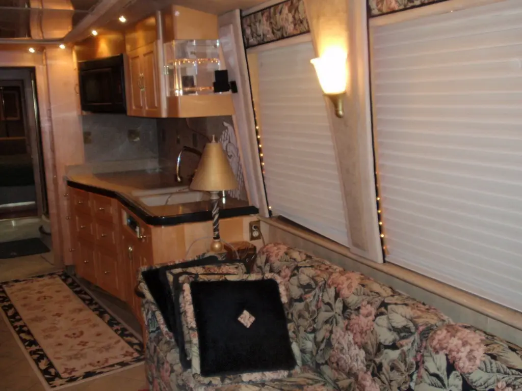Prevost XL Royale interior before new upholstery, flooring and window valances by Excalibur Coach