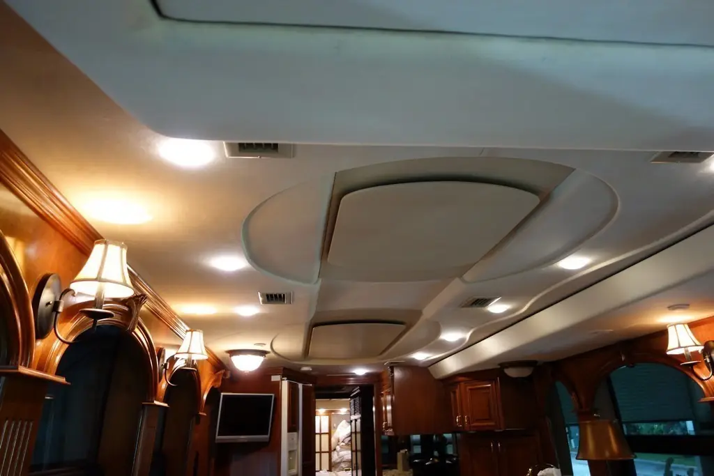 Prevost XL II Country Coach ceiling before a new design with ultraleather accents by Excalibur Coach